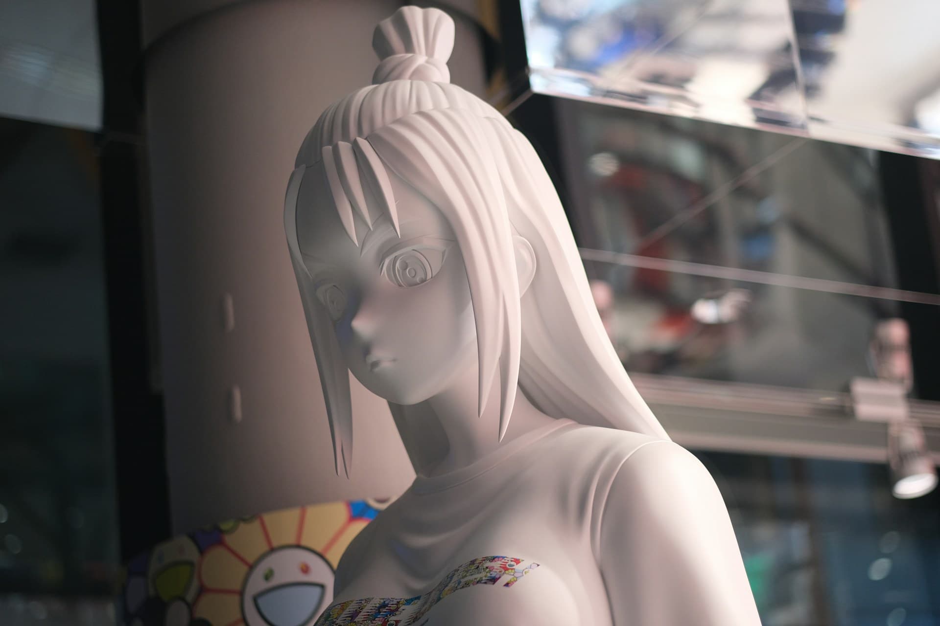 Unpainted primed 3D printed figurine bust showing fine sculpted hair and facial detail