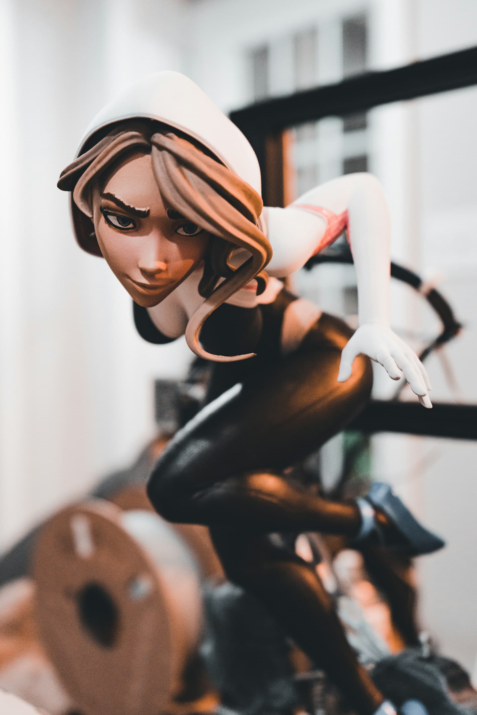 Fully hand-painted resin figurine with detailed skin tones and glossy black suit