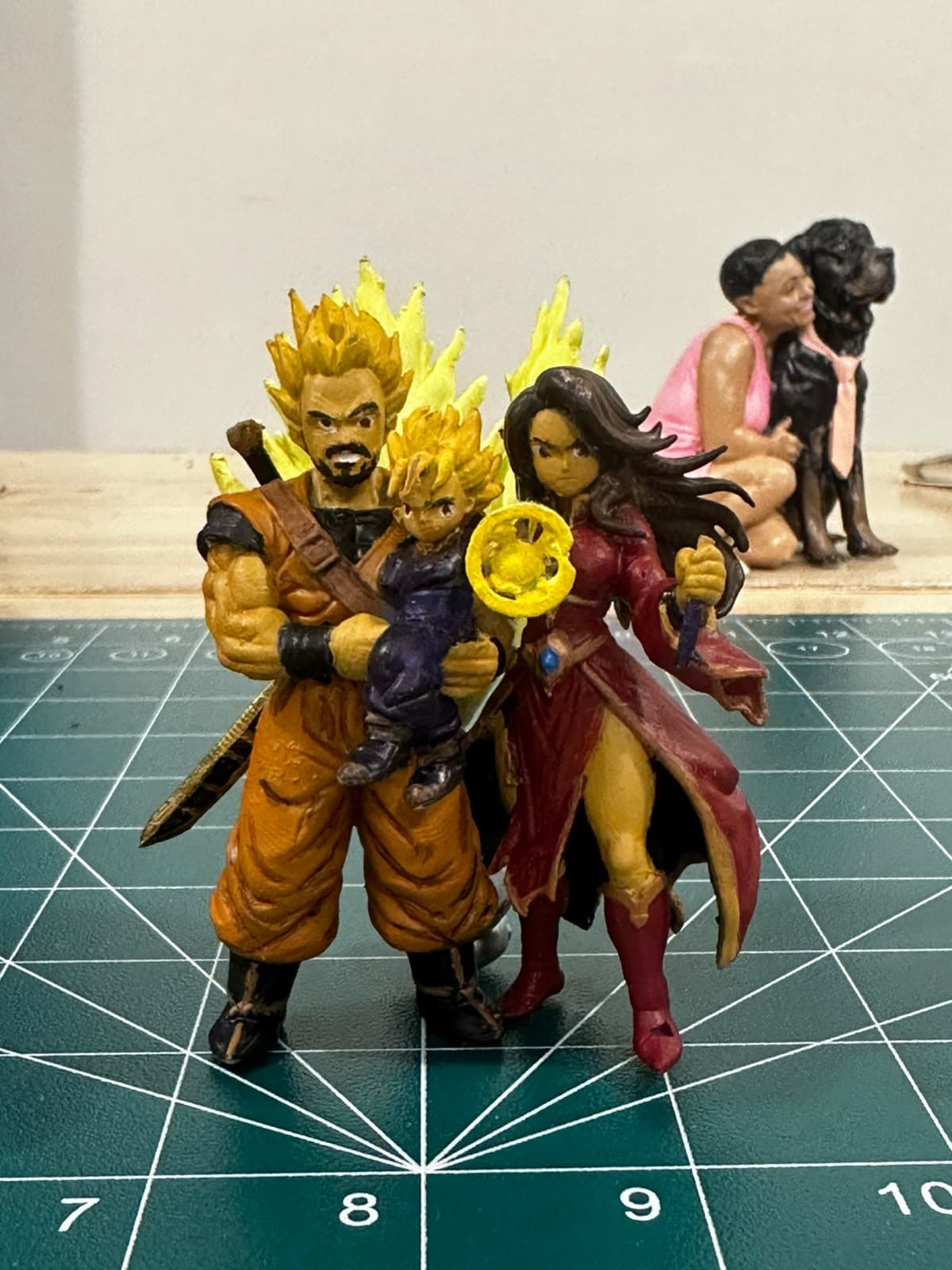 Hand-painted custom figurine group with stylized character designs