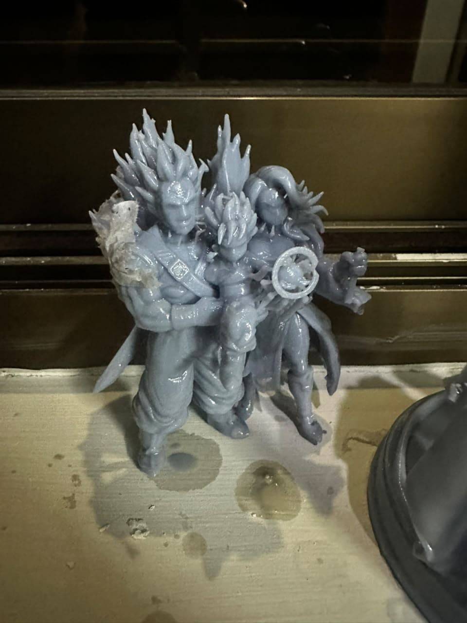 Freshly 3D printed figurine group before hand-painting